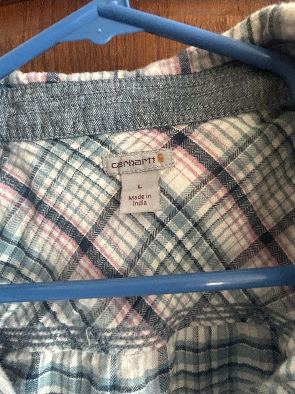Women’s short sleeve button-down, Carhartt plaid shirt.